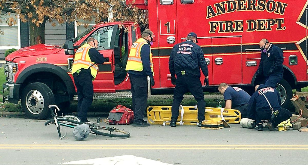 Ambulance hit cyclist whilst on an emergency call